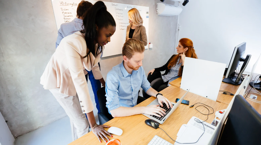 young businesspeople in office refurbishment contractors
